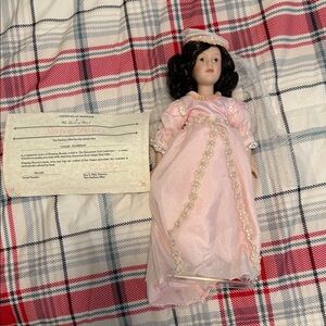 Danbury Mint Pink Porcelain Doll with Black Hair